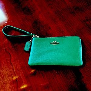 Coach stylish wristlet, brand new! Box went missing, sadly! Never used.